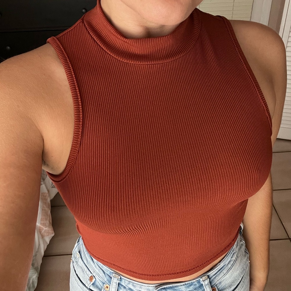 Size small top from Shein. Burnt Orange color